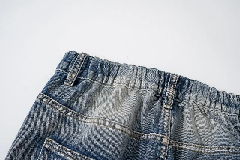 Custom Denim Note Patched Jeans with Slight Distress